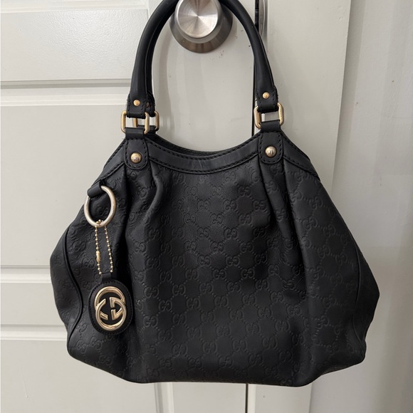 Authentic Gucci Black Leather Shoulder Bag and matching wallet